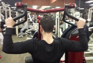 Working Out On Lat Pull Down