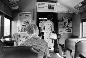 Andre Kertesz, Woman Reading Newspaper on the Long Island railroad, Sept 4, 1965