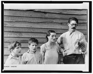 Alabama sharecropper Frank Tengle and family singing hymns, 1936