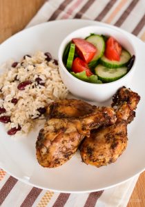 Rice and peas (kidney peas) with dark brown chicken
