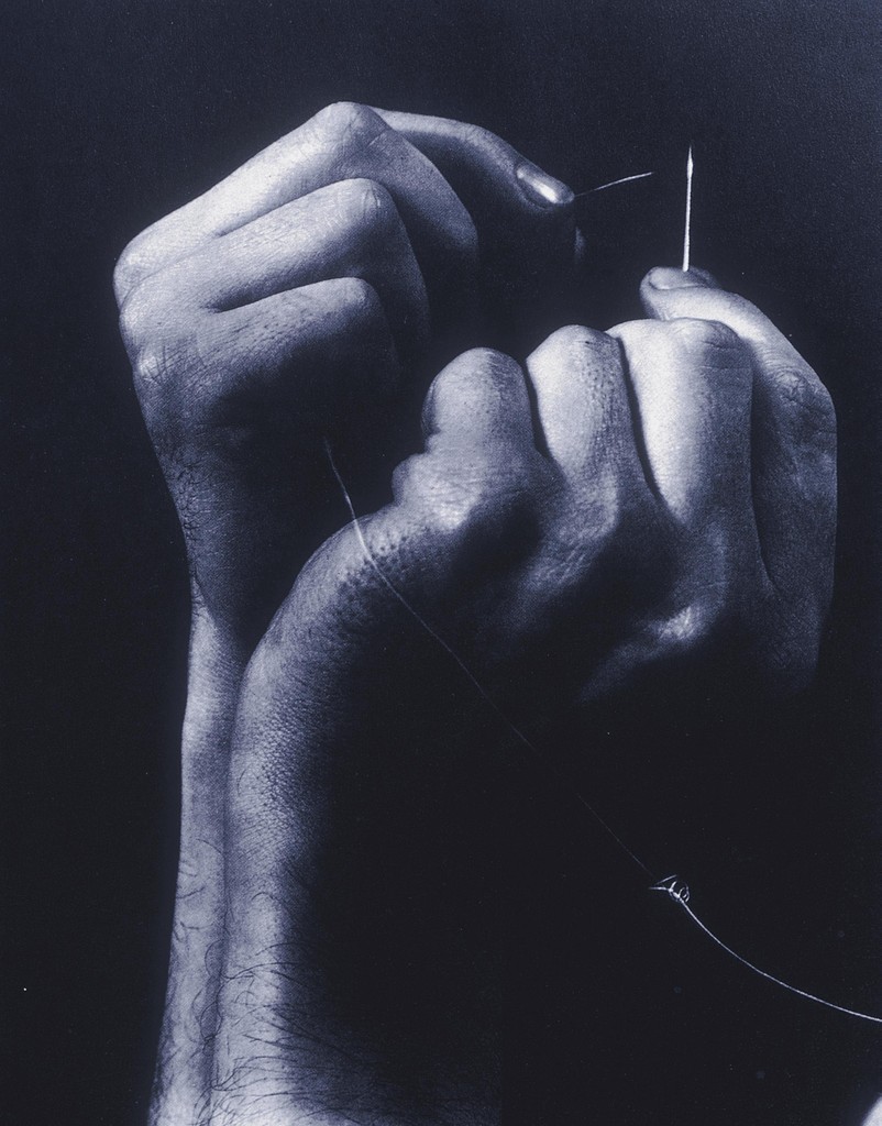 Hands Threading a Needle. Photographer: Anton Bruehl, 1929.