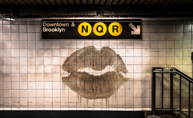 subway wall with kiss