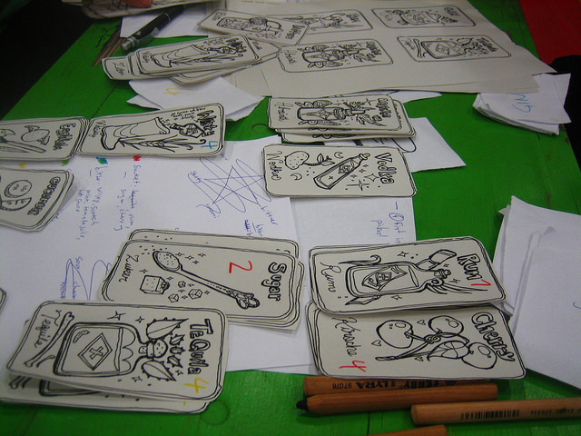 "Card Game Prototype at July Berlin Game Jam 2014" by Iwan Gabovitch is Licensed Under CC BY 2.0