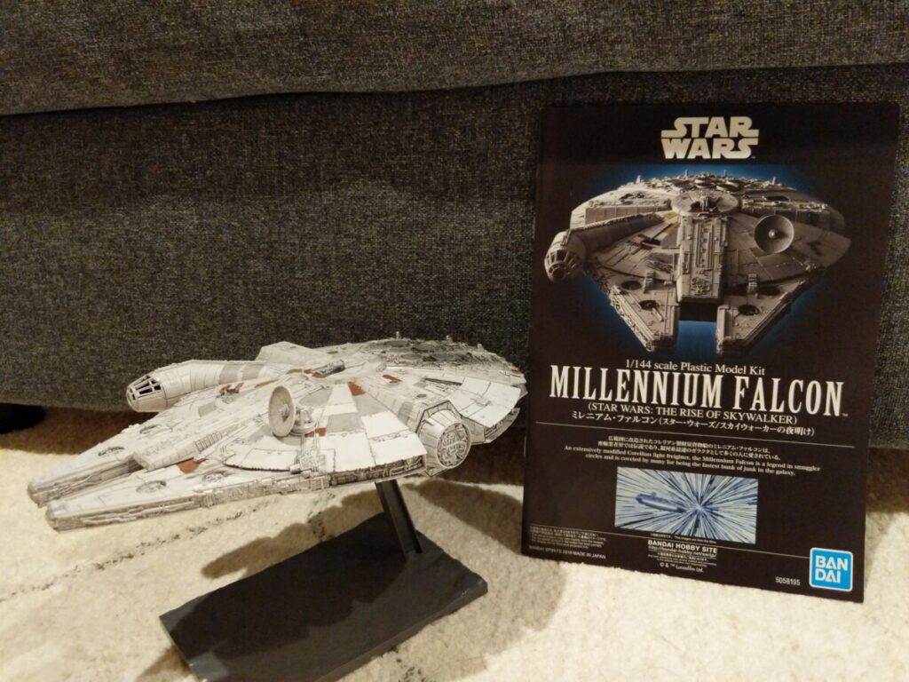 Millennium Falcon model with instruction manual