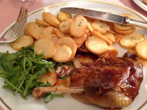 My own example of food photography: Duck confit and potatoes at Brasserie Mollard in Paris