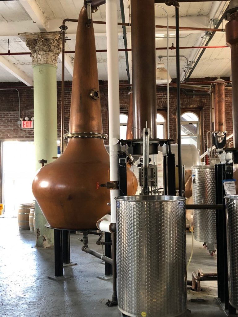 The production of whisky from barley to bottle (top), swan necked copper stills 
