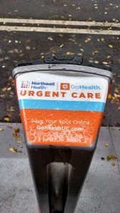 A photo of a branded City Bike rack with Northwell Urgent Care messaging on it.