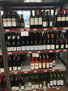 this is the display from the grand wines and liquor store in astoria, all the wines from the regions are placed together one separation is colors