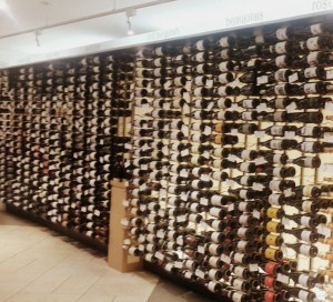 Red wines display in Crush by regions and prices from high to low start from top shelf to bottom