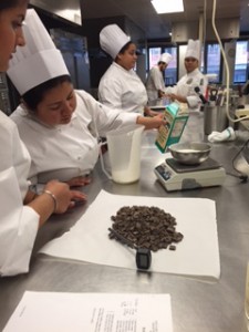 Sam measuring out ingredients for Red Rose Truffle. 