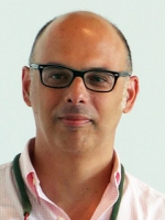 headshot of Professor De Santis.
