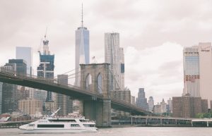 Photo of One World Trade and the Brooklyn Bridge across the East River