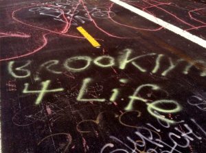 Photo of graffiti on concrete that reads "Brooklyn 4 Life"