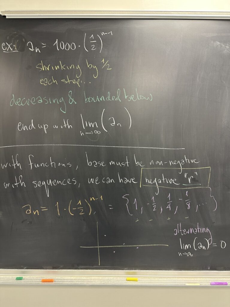 A photo of math written on a blackboard.