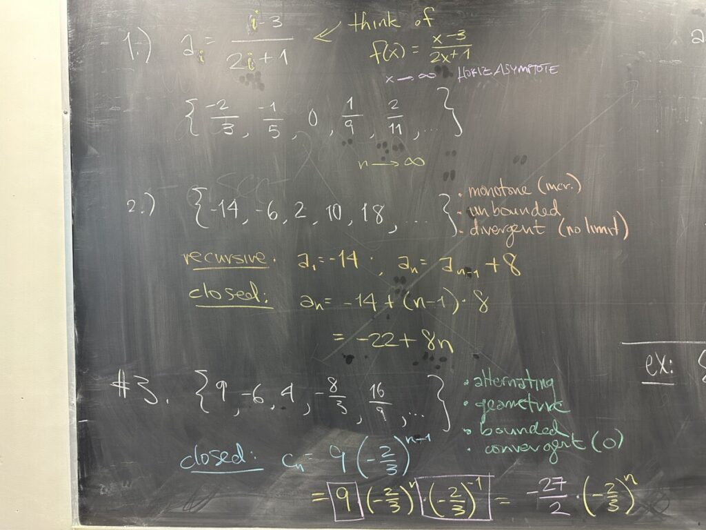 A photo of math written on a chalkboard.