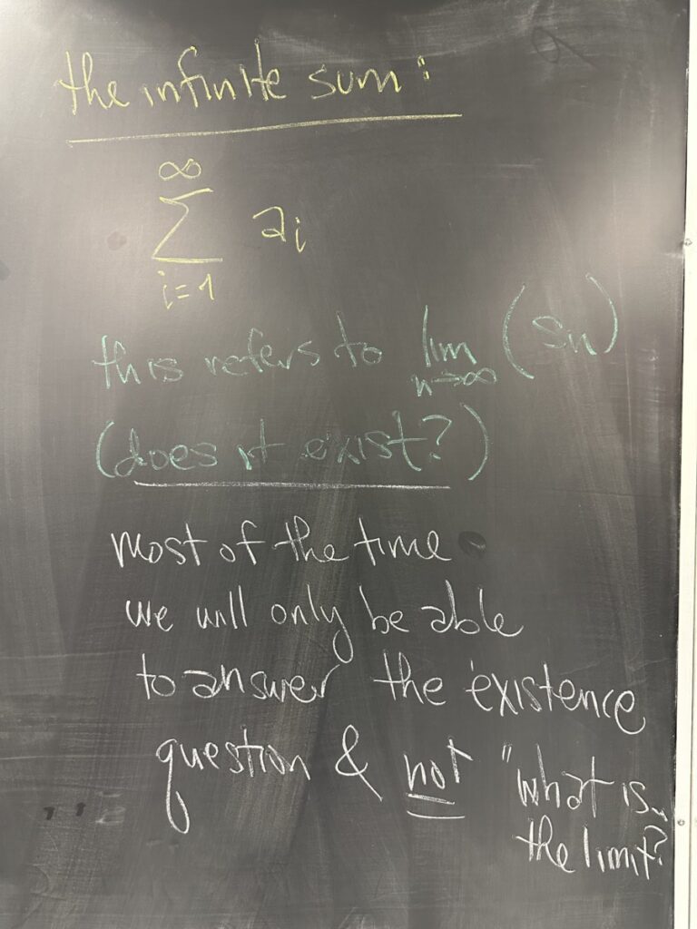 A photo of math written on a chalkboard.