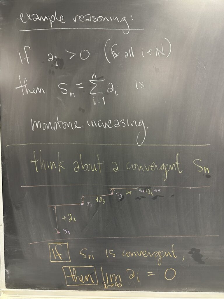 A photo of math written on a chalkboard.