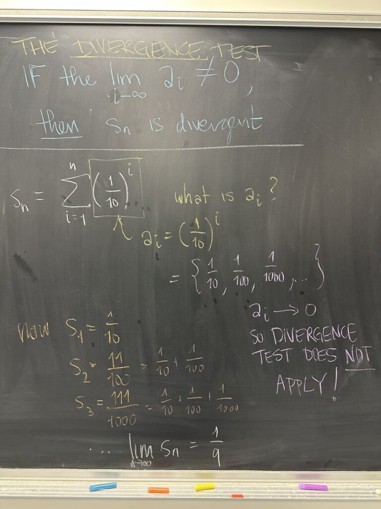 A photo of math written on a chalkboard.