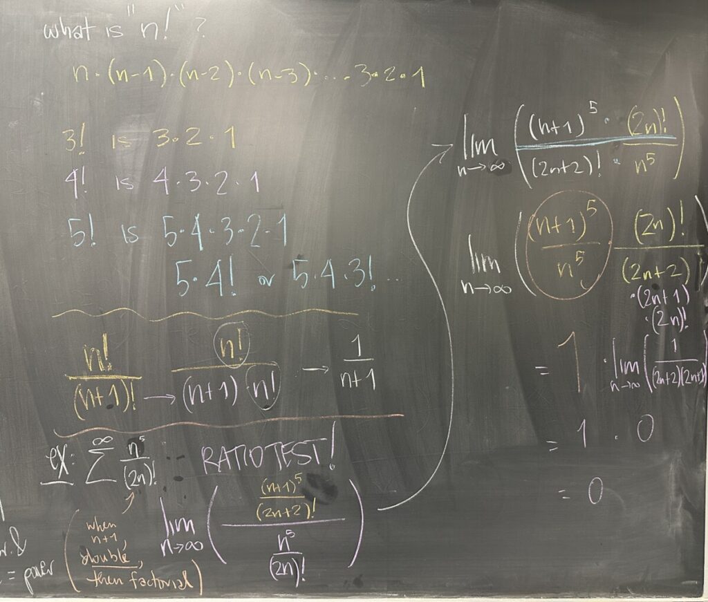 A photo of math class notes written on a chalkboard.