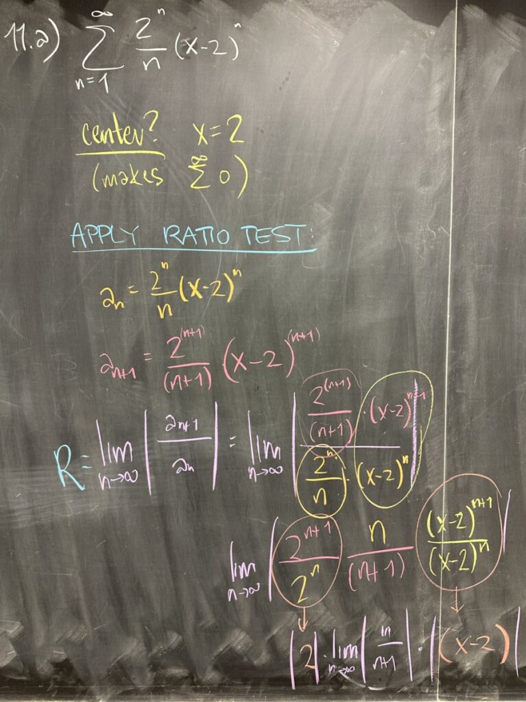 A photo of math course notes written on a blackboard.