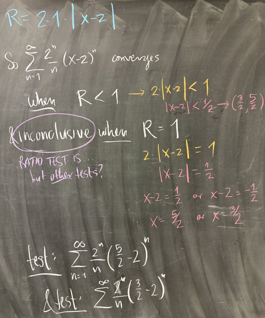 A photo of math course notes written on a blackboard.