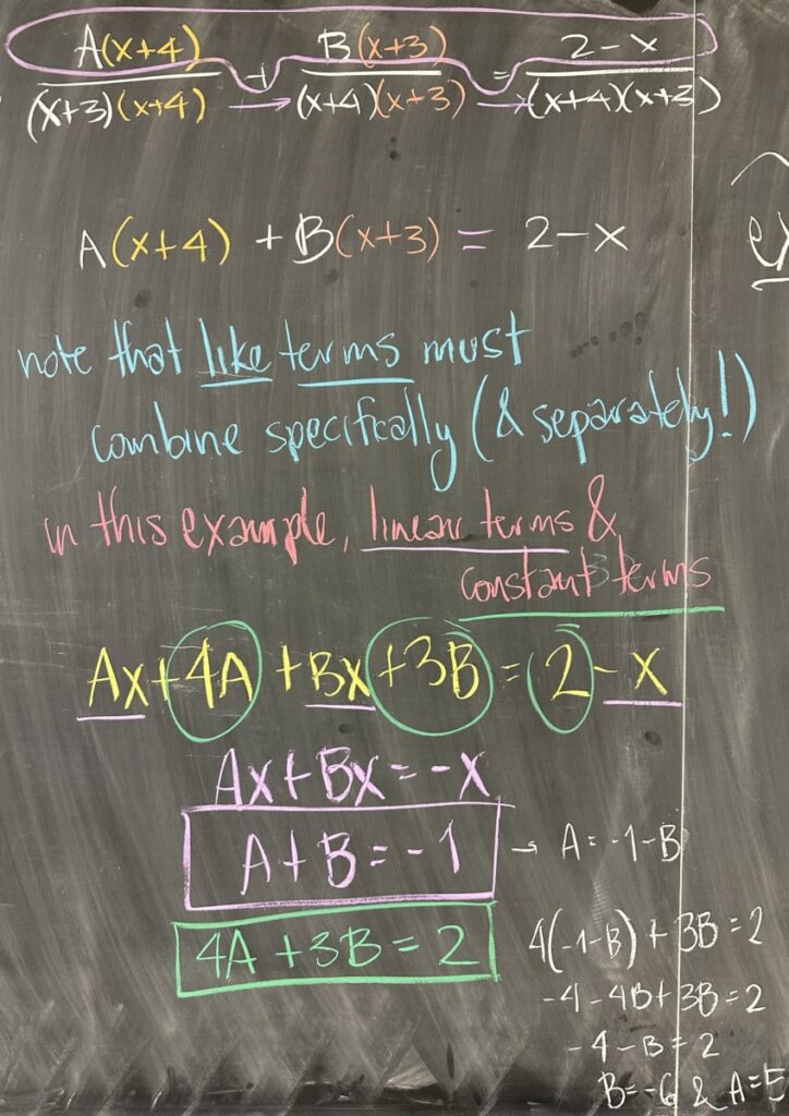 A photo of math course notes written on a chalkboard.