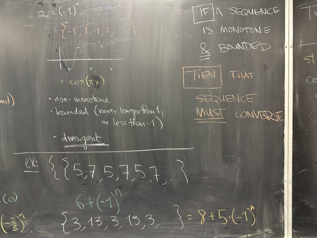 A photo of math written on a chalkboard.