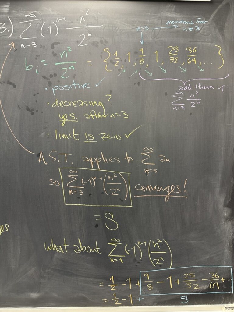 A photo of math class notes written on a chalkboard.