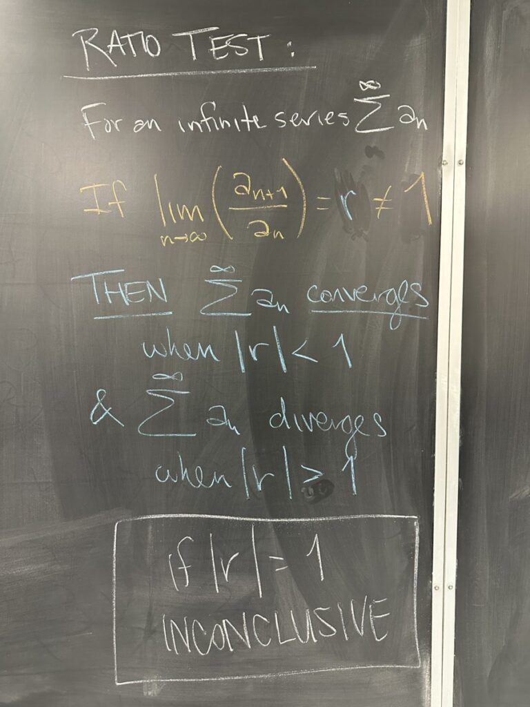 A photo of math class notes written on a chalkboard.