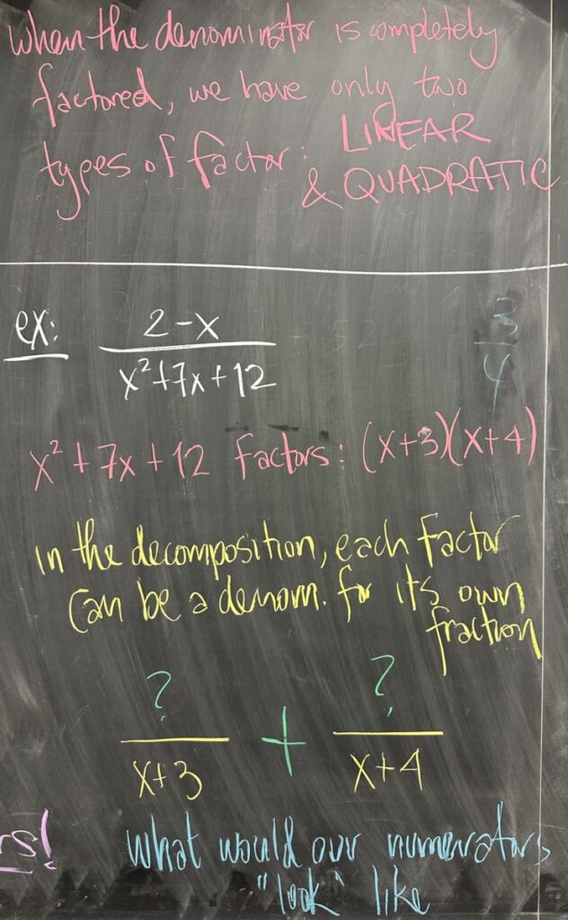 A photo of math course notes written on a chalkboard.