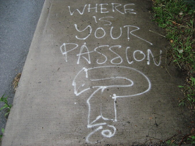 chalk on pavement reading "where is your passion?"