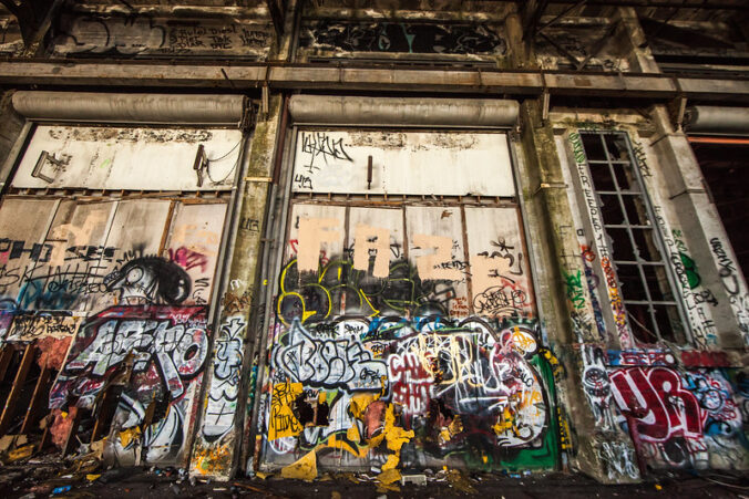 old building covered in graffiti