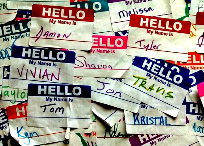 Many colorful nametags that read Hello My Name Is with names
