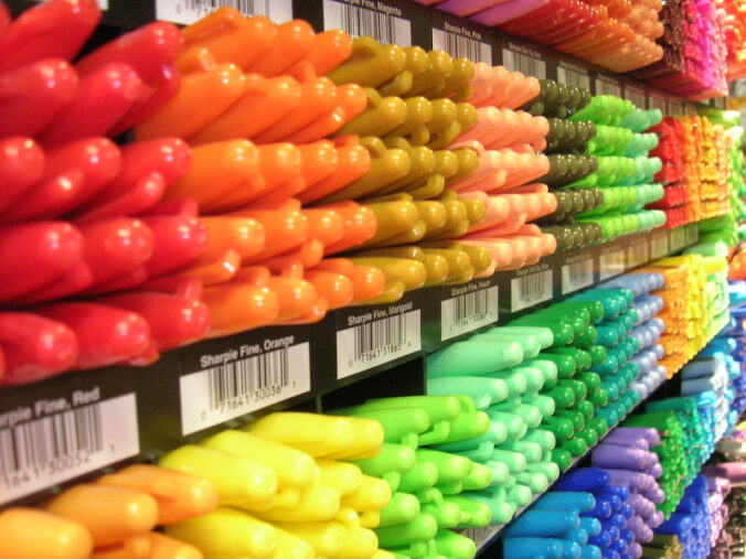 Store shelves iwth different color Sharpie markers