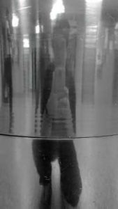 reflection in metal bin