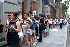 Consumers lining up for a sale in SoHo taken from creativecommons