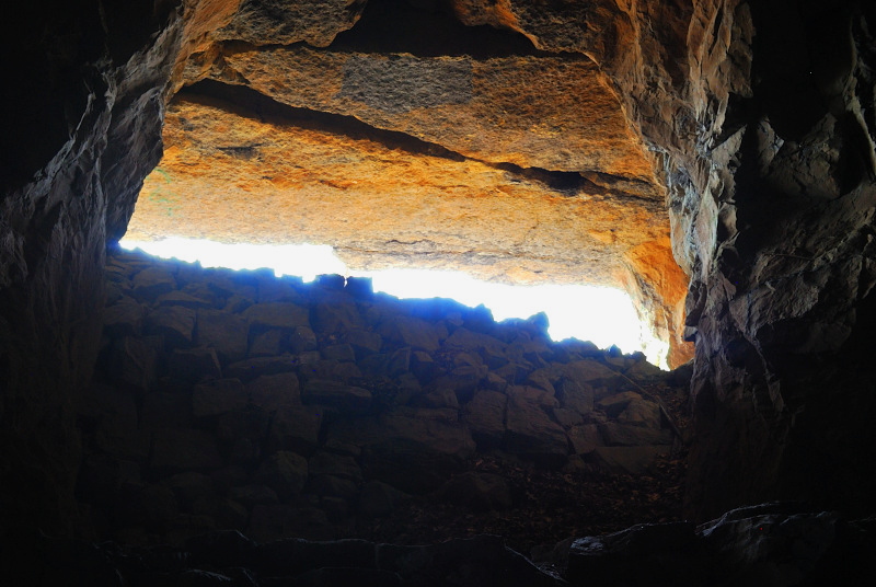 light coming in to the entrance of a cave