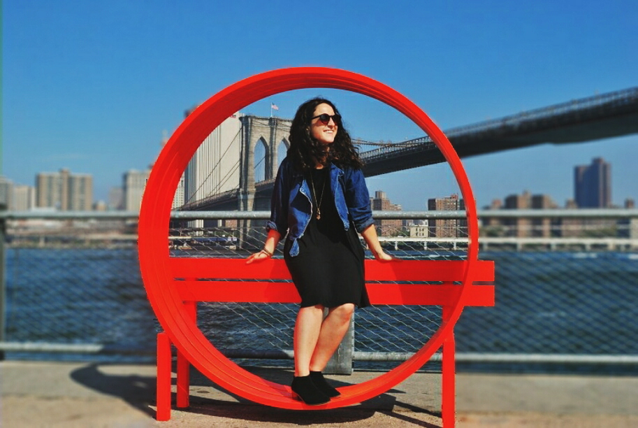 a woman standing inside a large red circle