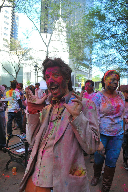 Man covered in colored paint