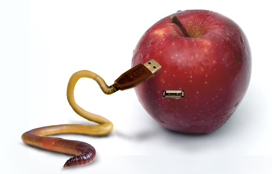 a worm morphing into a USB cable, slithering toward an apple