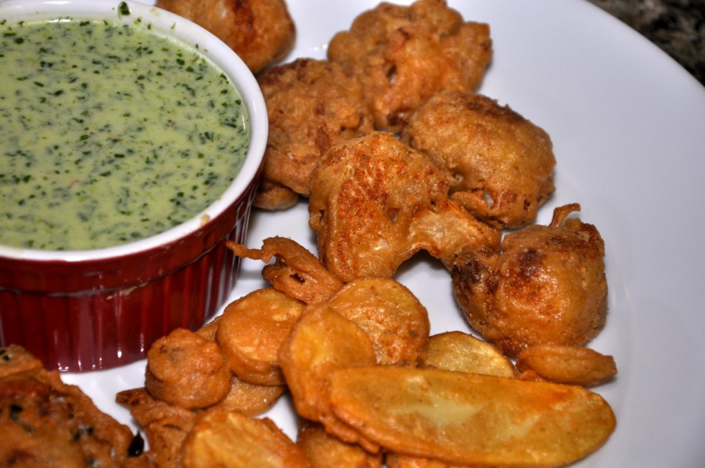 a dish of fried food with sauce