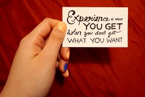 a card that says "Experience is what you get when you don't get what you want."