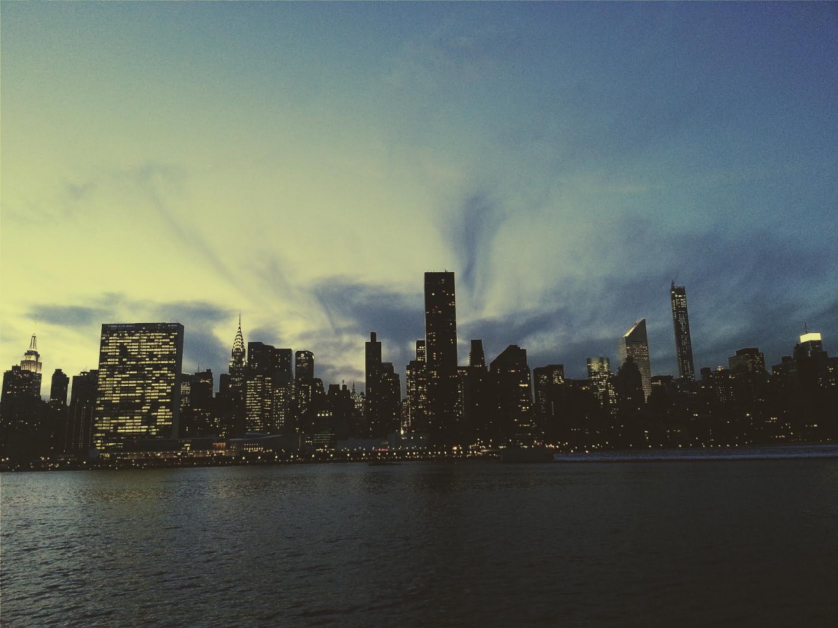 a city skyline at dusk
