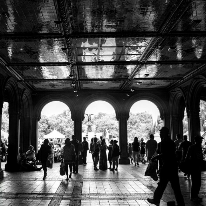 people in Central Park structure, in black and white