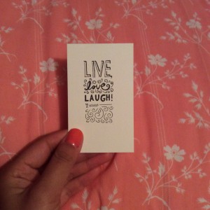 a card that says "Live, Love, and Laugh!'