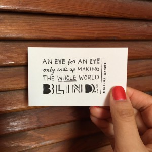 a card that says "An eye for an eye only ends up making the whole world blind."