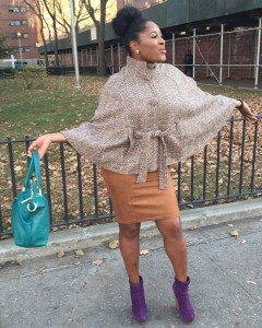 a woman of color wearing a shawl and purple booties