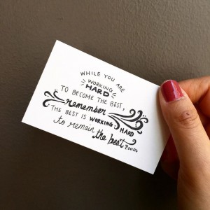 a card that says "While you are working hard to become the best, remember the best is working hard to remain the best."