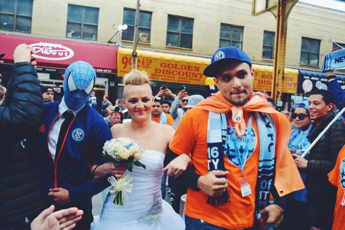 a bride and groom in a crowd