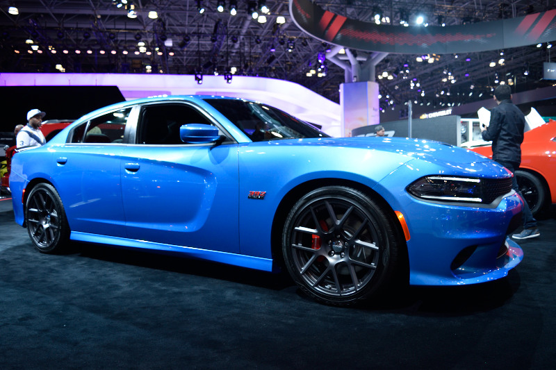a blue sports car on display